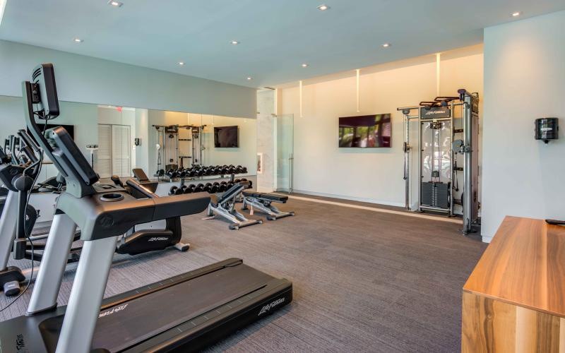 a gym with treadmills